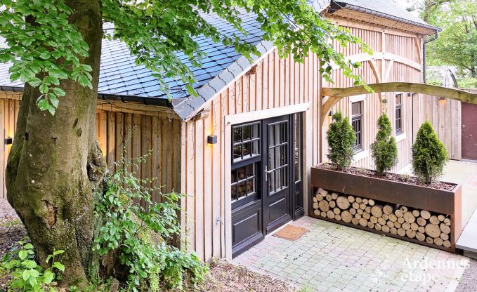 Comfortable holiday chalet in Bastogne with garden and sauna