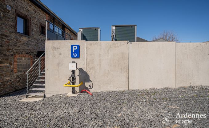 Charming holiday home in Bastogne: comfortable stay for 8 people with private garden and charging station