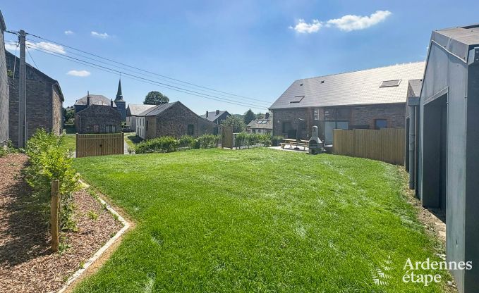 Charming holiday home in Bastogne: comfortable stay for 8 people with private garden and charging station