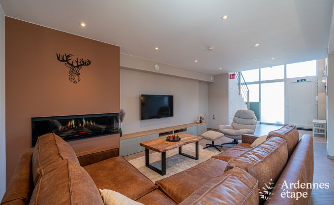 Charming holiday home in Bastogne: comfortable stay for 8 people with private garden and charging station