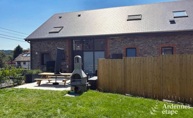 Charming holiday home in Bastogne: comfortable stay for 8 people with private garden and charging station