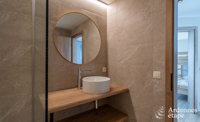 Charming holiday home in Bastogne: comfortable stay for 8 people with private garden and charging station