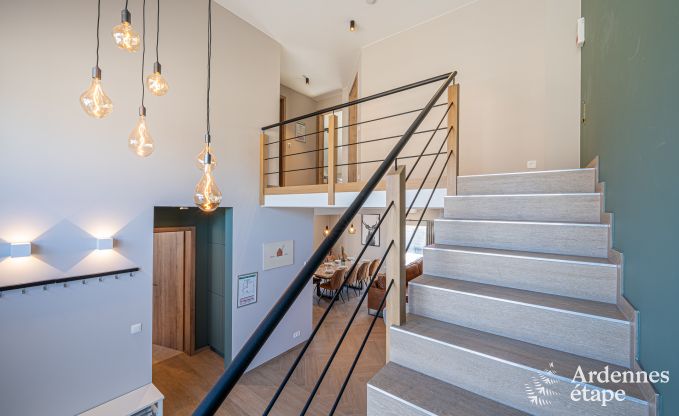 Charming holiday home in Bastogne: comfortable stay for 8 people with private garden and charging station