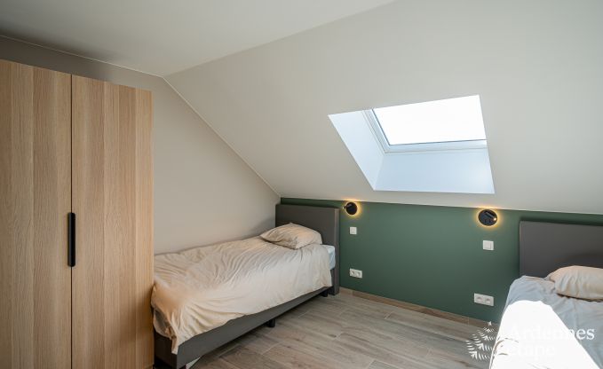 Charming holiday home in Bastogne: comfortable stay for 8 people with private garden and charging station