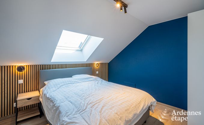 Charming holiday home in Bastogne: comfortable stay for 8 people with private garden and charging station