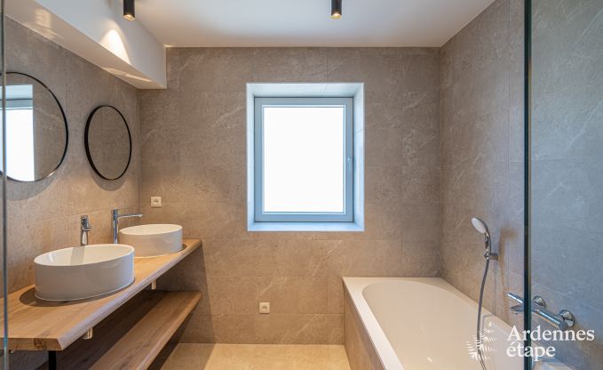 Charming holiday home in Bastogne: comfortable stay for 8 people with private garden and charging station