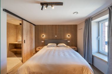 Holiday home in Bastogne: spacious accommodation for 14 people with 6 bedrooms and playroom