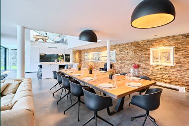 Spacious luxury villa in Bertrix for 16 people with heated outdoor pool and private terrace by the water