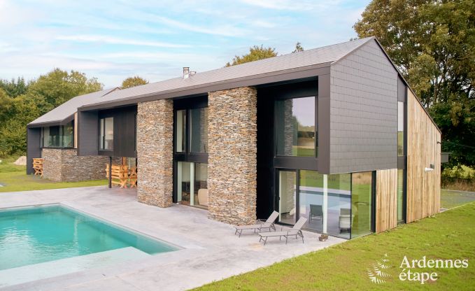 Spacious luxury villa in Bertrix for 16 people with heated outdoor pool and private terrace by the water