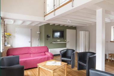 Spacious holiday apartment for 12 people with 5 bedrooms and shared private garden and wellness in Butgenbach