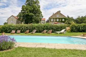 Charming holiday home with an outdoor swimming pool and stunning panoramic view for 26 guests in Yvoir
