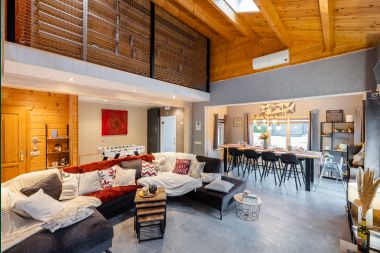 Spacious holiday home near Durbuy for 9 people with covered jacuzzi, fenced garden, and play area