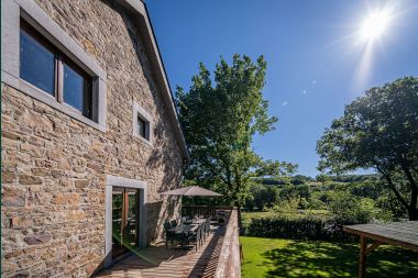 Holiday cottage with covered jacuzzi in Erezée for 16 persons in the Ardennes