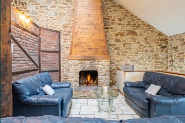 Spacious holiday home for 32 people in Ferrières with 12 bedrooms, sauna, jacuzzi and play facilities
