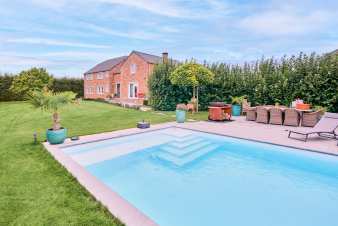 Holiday home for 10 people in Voeren with swimming pool, jacuzzi, private garden and modern facilities