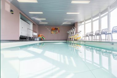 Spacious holiday home consisting of two adjoining buildings in Han-sur-Lesse for 13 people with indoor swimming pool