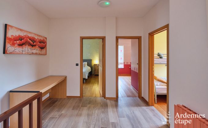 Spacious holiday home consisting of two adjoining buildings in Han-sur-Lesse for 13 people with indoor swimming pool