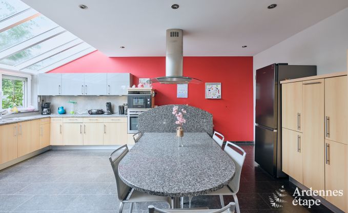 Spacious holiday home consisting of two adjoining buildings in Han-sur-Lesse for 13 people with indoor swimming pool