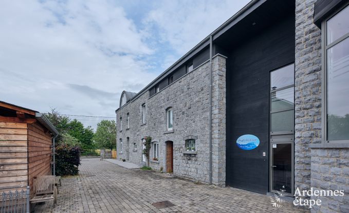 Spacious holiday home consisting of two adjoining buildings in Han-sur-Lesse for 13 people with indoor swimming pool