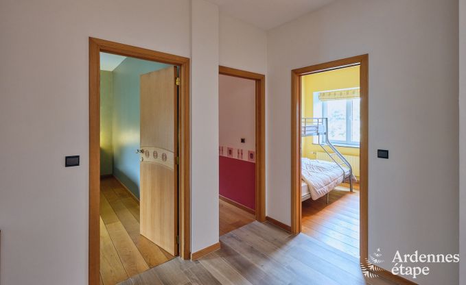 Spacious holiday home consisting of two adjoining buildings in Han-sur-Lesse for 13 people with indoor swimming pool