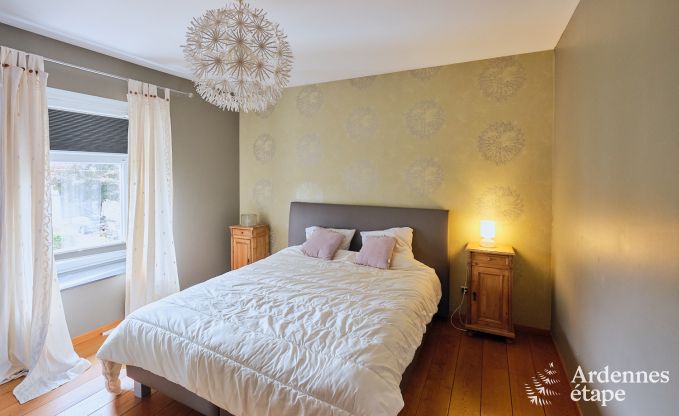 Spacious holiday home consisting of two adjoining buildings in Han-sur-Lesse for 13 people with indoor swimming pool