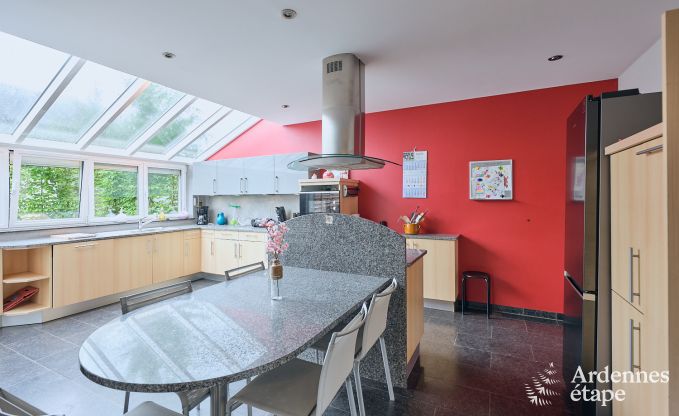 Spacious holiday home consisting of two adjoining buildings in Han-sur-Lesse for 13 people with indoor swimming pool