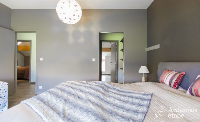 Spacious holiday home consisting of two adjoining buildings in Han-sur-Lesse for 13 people with indoor swimming pool