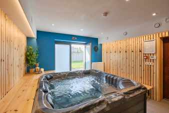 Holiday home Libramont (Ardennes) for 22 people with 9 bedrooms, jacuzzi, sauna, playroom, private garden