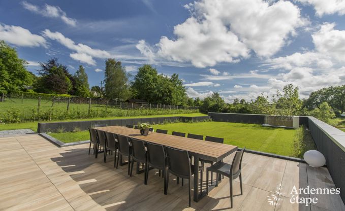 Holiday home for 15 people in Libramont with indoor swimming pool, sauna and private garden by the water