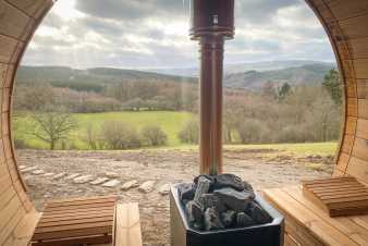Luxury villa for 12 people in Lierneux: 5 bedrooms, saunas, and breathtaking view of the Ardennes.