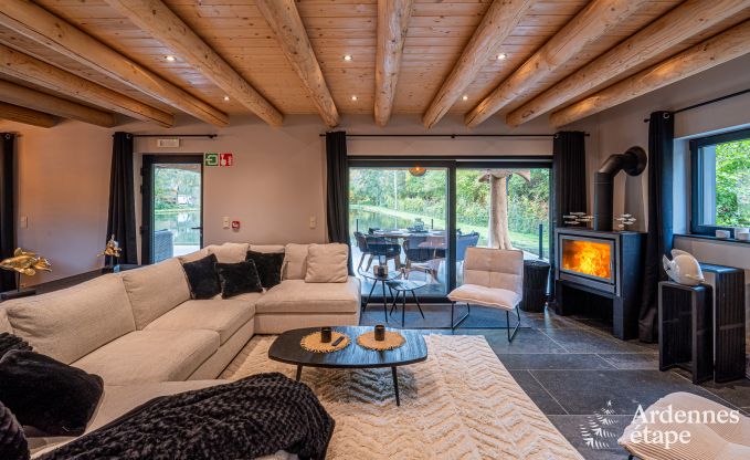 Spacious chalet for 8 people in Trois-Ponts with indoor-outdoor pool, sauna and private terrace by the water