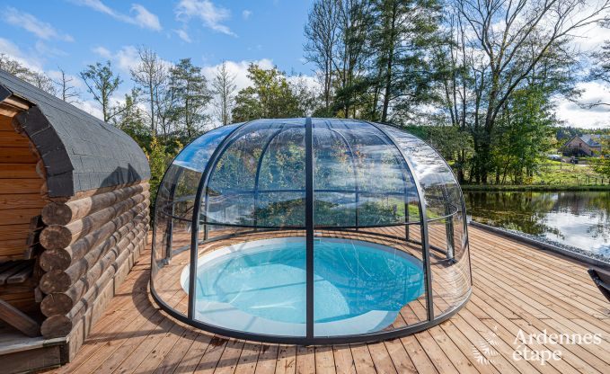 Spacious chalet for 8 people in Trois-Ponts with indoor-outdoor pool, sauna and private terrace by the water