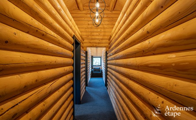 Spacious chalet for 8 people in Trois-Ponts with indoor-outdoor pool, sauna and private terrace by the water