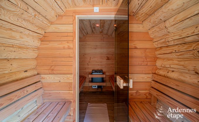 Spacious chalet for 8 people in Trois-Ponts with indoor-outdoor pool, sauna and private terrace by the water