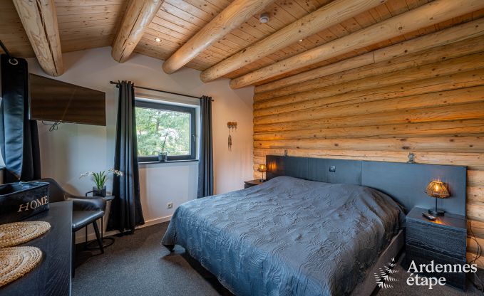 Spacious chalet for 8 people in Trois-Ponts with indoor-outdoor pool, sauna and private terrace by the water