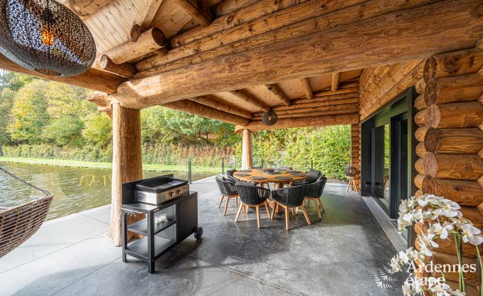 Spacious chalet for 8 people in Trois-Ponts with indoor-outdoor pool, sauna and private terrace by the water