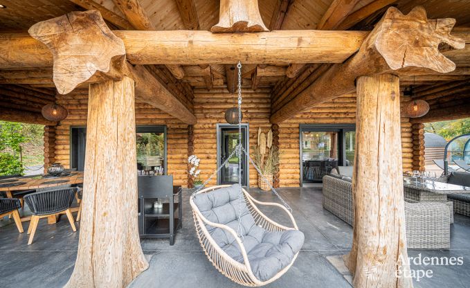 Spacious chalet for 8 people in Trois-Ponts with indoor-outdoor pool, sauna and private terrace by the water