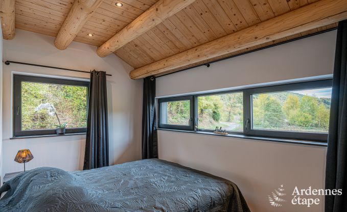 Spacious chalet for 8 people in Trois-Ponts with indoor-outdoor pool, sauna and private terrace by the water