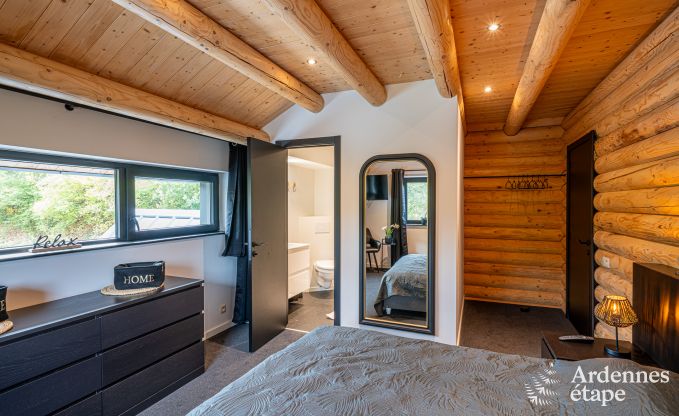 Spacious chalet for 8 people in Trois-Ponts with indoor-outdoor pool, sauna and private terrace by the water