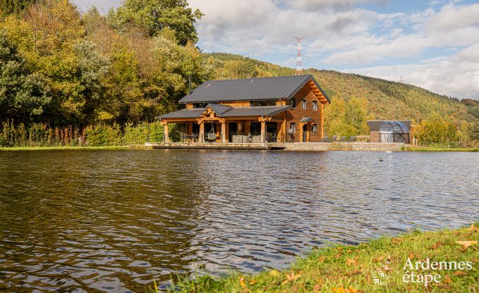 Spacious chalet for 8 people in Trois-Ponts with indoor-outdoor pool, sauna and private terrace by the water