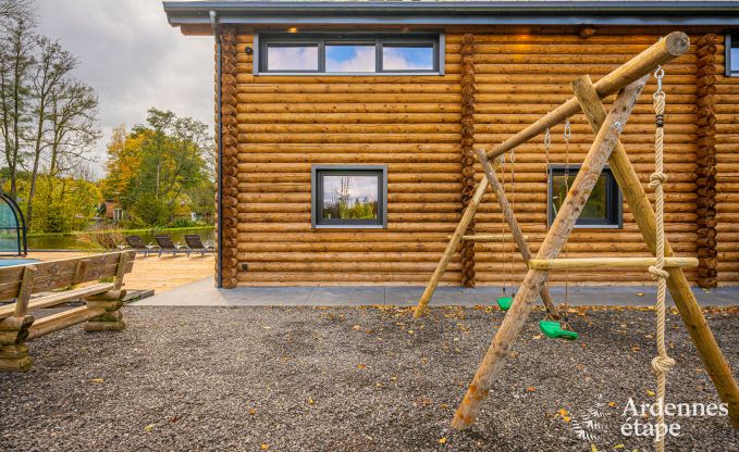 Spacious chalet for 8 people in Trois-Ponts with indoor-outdoor pool, sauna and private terrace by the water