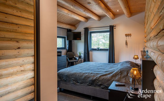 Spacious chalet for 8 people in Trois-Ponts with indoor-outdoor pool, sauna and private terrace by the water