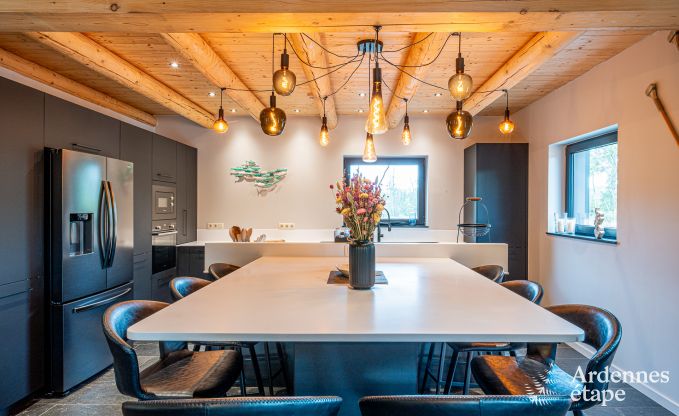 Spacious chalet for 8 people in Trois-Ponts with indoor-outdoor pool, sauna and private terrace by the water