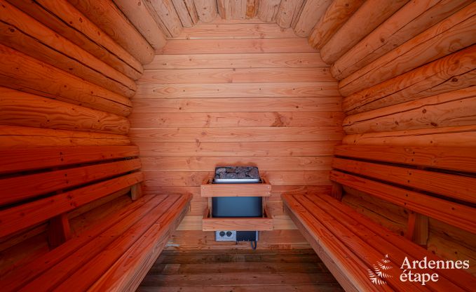 Spacious chalet for 8 people in Trois-Ponts with indoor-outdoor pool, sauna and private terrace by the water