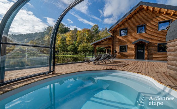 Spacious chalet for 8 people in Trois-Ponts with indoor-outdoor pool, sauna and private terrace by the water