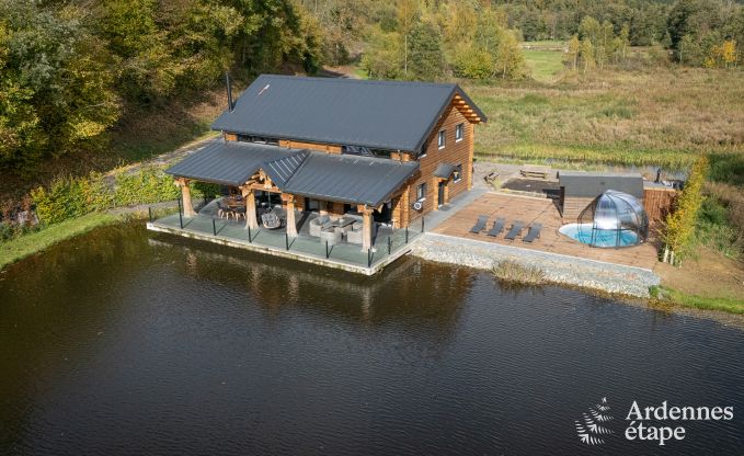 Spacious chalet for 8 people in Trois-Ponts with indoor-outdoor pool, sauna and private terrace by the water