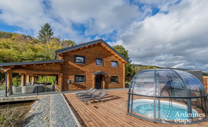 Spacious chalet for 8 people in Trois-Ponts with indoor-outdoor pool, sauna and private terrace by the water