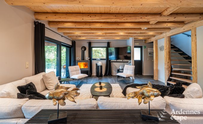 Spacious chalet for 8 people in Trois-Ponts with indoor-outdoor pool, sauna and private terrace by the water