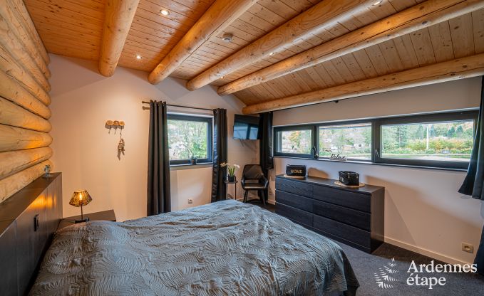 Spacious chalet for 8 people in Trois-Ponts with indoor-outdoor pool, sauna and private terrace by the water