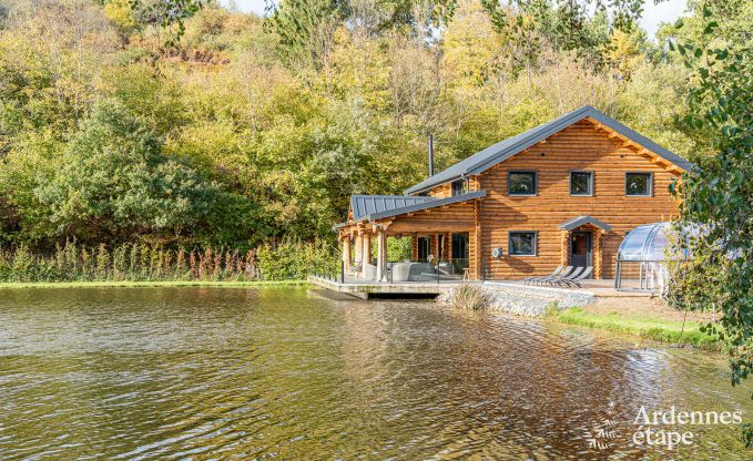 Spacious chalet for 8 people in Trois-Ponts with indoor-outdoor pool, sauna and private terrace by the water